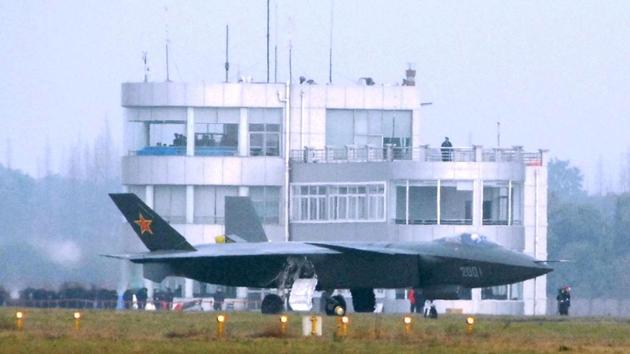 This file photo taken on January 6, 2011 shows China's new stealth fighter jet, the J-20, the country's first radar-evading combat aircraft, during one of many test runs at the military airbase in Chengdu, southwest China's Sichuan province. China has put its first stealth fighter into military service, in the latest milestone highlighting the modernisation of the country's armed forces. (AFP Photo) This file photo taken on January 6, 2011 shows China's new stealth fighter jet, the J-20, the country's first radar-evading combat aircraft, during one of many test runs at the military airbase in Chengdu, southwest China's Sichuan province. China has put its first stealth fighter into military service, in the latest milestone highlighting the modernisation of the country's armed forces. (AFP Photo)