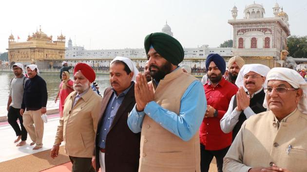 Congress candidate for Lok Sabha Gurjeet Singh Aujla along with other party members paying obeisance at Golden Temple, a day ahead of election results on Friday.(Gurpreet Singh/HT Photo)