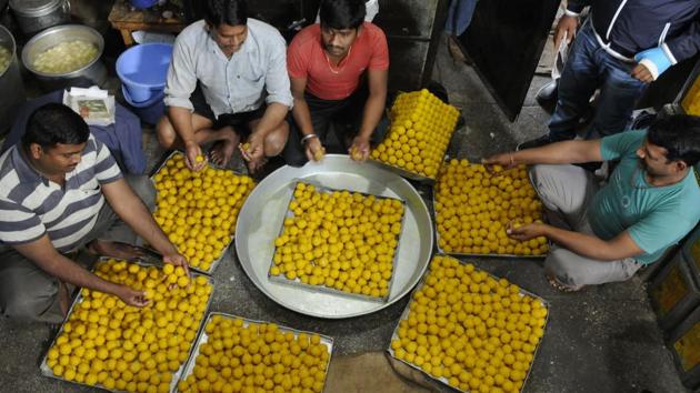 Sweet shops in Patiala busy preparing sweets for the counting day. (Bharat Bhushan/ht photo)
