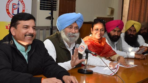 AAP leader HS Phoolka addresses the media as AAP Punjab affairs in-charge Sanjay Singh looks on at the Press Club in Jalandhar. (Sikandar Singh Chopra/Ht Photo)