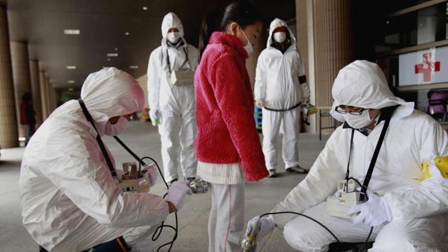A young evacuee is screened at a shelter for leaked radiation from the tsunami-ravaged Fukushima Dai-ichi nuclear power plant in Fukushima on March 24, 2011. (AP File Photo) A young evacuee is screened at a shelter for leaked radiation from the tsunami-ravaged Fukushima Dai-ichi nuclear power plant in Fukushima on March 24, 2011. (AP File Photo)