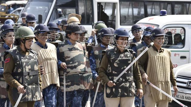The entrance to the court was barricaded and over 300 police personnel, including women constables, were deployed with batons, helmets and shields. (Sanjeev Verma/HT Photo) The entrance to the court was barricaded and over 300 police personnel, including women constables, were deployed with batons, helmets and shields. (Sanjeev Verma/HT Photo)