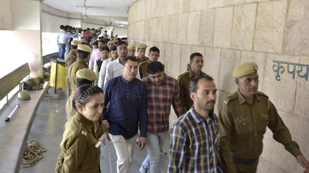 Thirteen accused have been held guilty of murder whereas 18 are convicted of rioting and other crimes under various sections of the IPC. The quantum of punishment will be pronounced on March 17.(Sanjeev Verma/HT Photo) Thirteen accused have been held guilty of murder whereas 18 are convicted of rioting and other crimes under various sections of the IPC. The quantum of punishment will be pronounced on March 17.(Sanjeev Verma/HT Photo)