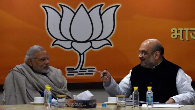 PM Narendra Modi and BJP President Amit Shah during the Central Election Committee meeting for Uttar Pradesh elections at BJP headquarters in New Delhi. (PTI File Photo) PM Narendra Modi and BJP President Amit Shah during the Central Election Committee meeting for Uttar Pradesh elections at BJP headquarters in New Delhi. (PTI File Photo)