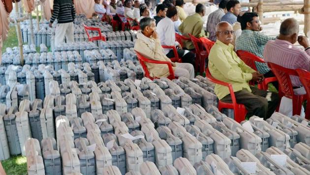 Poll officials wait to leave for election duty at an EVM distribution centre in Varanasi on March 7, 2017.(PTI File Photo)