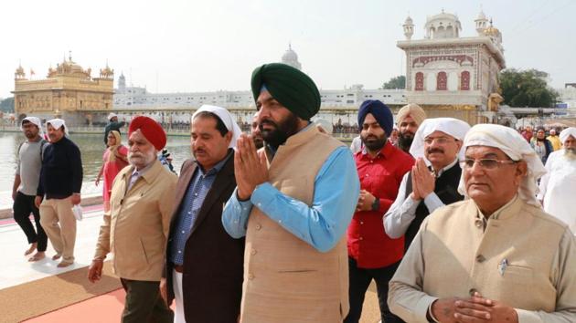 Congress candidates offer prayers on the eve of counting at Golden Temple in Amritsar. (Gurpreet Singh/HT Photo)