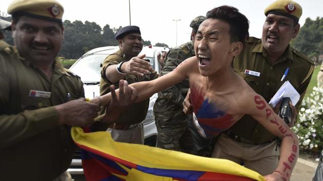 Tibetan Youth Congress activists protested outside the Chinese embassy on the occasion of 58th anniversary of Tibetan Uprising Day in Delhi. (Ravi Choudhary/HT PHOTO) Tibetan Youth Congress activists protested outside the Chinese embassy on the occasion of 58th anniversary of Tibetan Uprising Day in Delhi. (Ravi Choudhary/HT PHOTO)