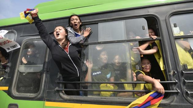 Tibetan protestors shouting slogans outside the Chinese Embassy in New Delhi. (Ravi Choudhary/HT PHOTO) Tibetan protestors shouting slogans outside the Chinese Embassy in New Delhi. (Ravi Choudhary/HT PHOTO)