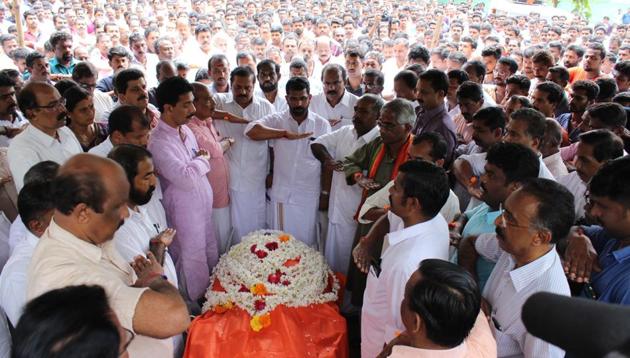 Mourners at the house of a person killed in RSS-CPI(M) clashes in Dharmadam recently. Recurring political violence between the two political groups have claimed over 200 lives in north Kerala's Kannur district.(Ramesh Babu/HT Photo)