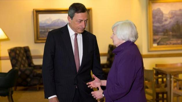 Fed chair Janet Yellen speaks to ECB president Mario Draghi at the Jackson Hole, Wyoming (Reuters photo) Fed chair Janet Yellen speaks to ECB president Mario Draghi at the Jackson Hole, Wyoming (Reuters photo)