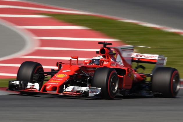 Kimi Raikkonen set the fastest time in pre-testing on a day Formula One paid tributes to former champion John Surtees, who died at the age of 83. (AFP) Kimi Raikkonen set the fastest time in pre-testing on a day Formula One paid tributes to former champion John Surtees, who died at the age of 83. (AFP)