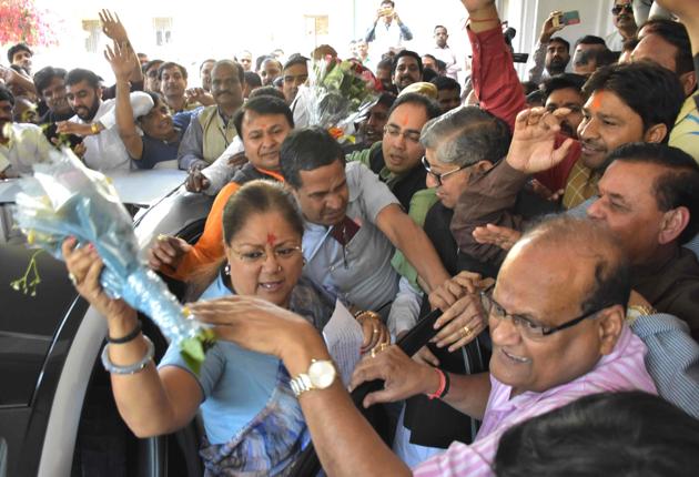Rajasthan chief minister Vasundhara Raje arrives at the BJP office in Jaipur to celebrate the party's clean sweep in Uttar Pradesh assembly poll on Saturday.(Prabhakar Sharma)