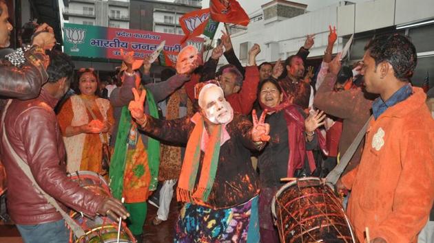 Celebrations at BJP office in Dehradun where the party is projected to be in majority to form government. (Vinay Santosh Kumar/Ht Photo)