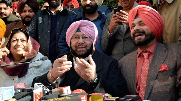 Amritsar: Punjab Pradesh Congress Committee President Amarinder Singh, Congress party candidate and former BJP MP Navjot Singh Sidhu, AICC in charge of Punjab Asha Kumari along with other congress leaders during a joint press conference, in Amritsar on Thursday. PTI Photo(PTI1_19_2017_000056B)(PTI)