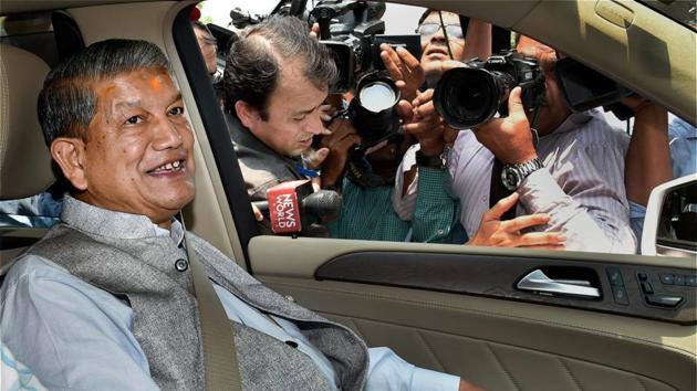 Uttarakhand chief minister Harish Rawat appeared to be on the way away with the BJP taking a clear lead over the Congress, according to initial trends on Saturday (PTI file photo) Uttarakhand chief minister Harish Rawat appeared to be on the way away with the BJP taking a clear lead over the Congress, according to initial trends on Saturday (PTI file photo)