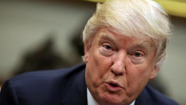 President Donald Trump’s revamped travel ban is facing its first major legal setback, after a federal judge halted enforcement of the directive that would deny US entry to the wife and child of a Syrian refugee already granted asylum. (Reuters Photo) President Donald Trump’s revamped travel ban is facing its first major legal setback, after a federal judge halted enforcement of the directive that would deny US entry to the wife and child of a Syrian refugee already granted asylum. (Reuters Photo)