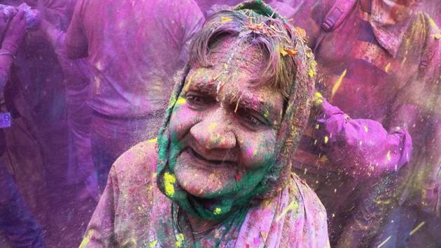 A widow  during celebrations for Holi, the Festival of Colors, at Gopinath temple in Mumbai (Pratik Chorge/HT Photo) 