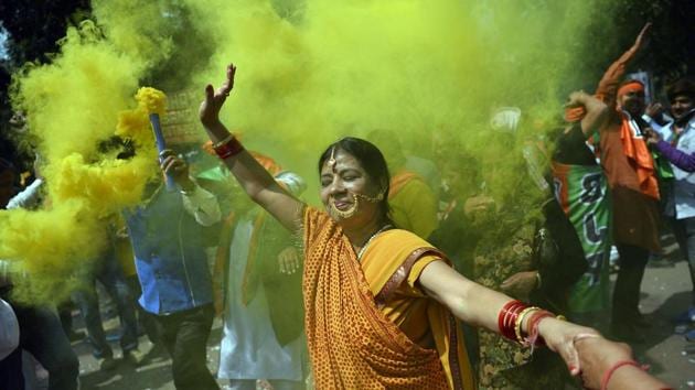 Supporters of Bhartiya Janata Party celebrate elections results outside the party headquarters in New Delhi on March 11, 2017. (AFP) Supporters of Bhartiya Janata Party celebrate elections results outside the party headquarters in New Delhi on March 11, 2017. (AFP)