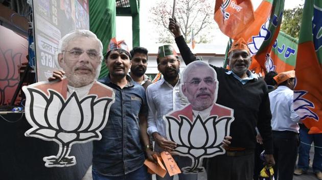 Jubilant BJP workers and supporters at party headquarters in New Delhi. (MOHD Zakir/HT Photo) Jubilant BJP workers and supporters at party headquarters in New Delhi. (MOHD Zakir/HT Photo)