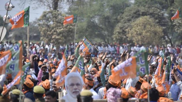 BJP supporters at a rally at Mirzapur, March 3. Development and all it stood for seems a very distant mirage as the winner stands tall and the loser small. (Arun Sharma/HT PHOTO) BJP supporters at a rally at Mirzapur, March 3. Development and all it stood for seems a very distant mirage as the winner stands tall and the loser small. (Arun Sharma/HT PHOTO)
