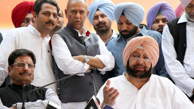 Punjab State Congress Chief and chief ministerial candidate Capt. Amrinder Singh (R) addressing press conference with senior Congress leader Gulchain Singh Charak after declaration of results on March 6, 2012 in Chandigarh, India. He accepted the responsibility of party’s poor performance in Punjab Assembly Elections. (rajnish katyal/HT Photo)