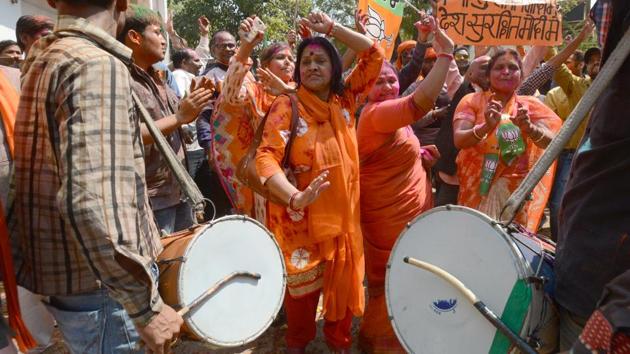 BJP workers celebrating the party's victory in the UP election and playing Holi at the party office in Lucknow. (ashok dutta/ht photo) BJP workers celebrating the party's victory in the UP election and playing Holi at the party office in Lucknow. (ashok dutta/ht photo)