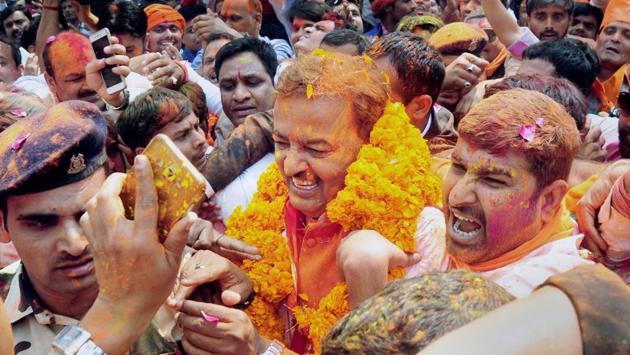 Uttar Pradesh BJP president Keshav Prasad Maurya celebrate with supporters as the early trends show the party's gargantuan victory in the state assembly polls, at BJP office in Lucknow on March 11. (PTI Photo) Uttar Pradesh BJP president Keshav Prasad Maurya celebrate with supporters as the early trends show the party's gargantuan victory in the state assembly polls, at BJP office in Lucknow on March 11. (PTI Photo)