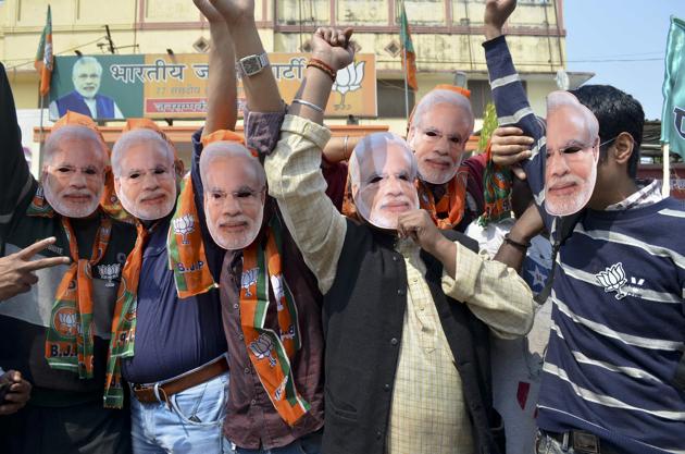 BJP's workers celebrate after party massive win Uttar Pradesh assembly elections in Varanasi on March 11. (Adarsh Gupta / Hindustan Times) BJP's workers celebrate after party massive win Uttar Pradesh assembly elections in Varanasi on March 11. (Adarsh Gupta / Hindustan Times)