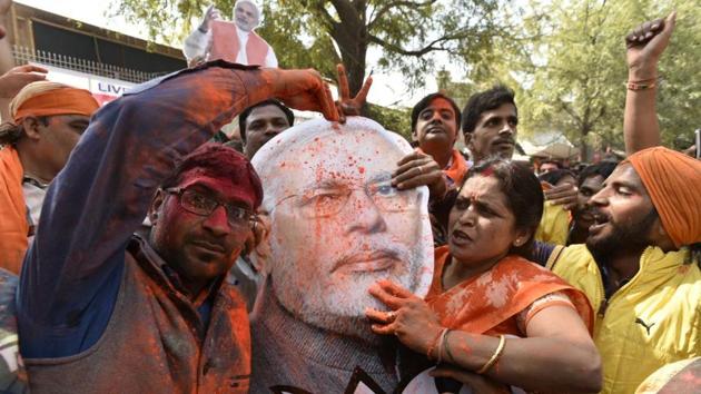 BJP workers celebrate in Lucknow. (Arvind Yadav/HT Photo) 