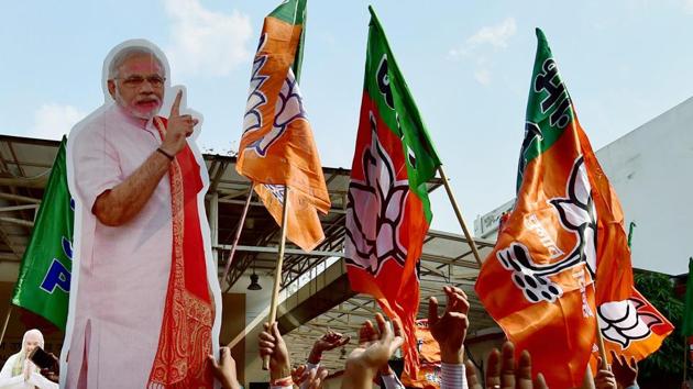 The BJP rode on Prime Minister Narendra Modi’s shoulders to power in Uttar Pradesh and Uttarakhand on Saturday. (PTI) The BJP rode on Prime Minister Narendra Modi’s shoulders to power in Uttar Pradesh and Uttarakhand on Saturday. (PTI)
