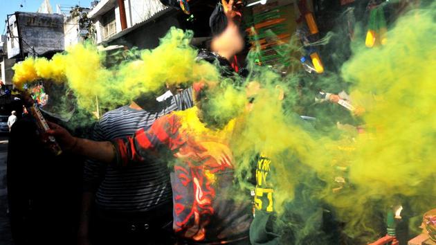 Youth play with water and coloured powder during Holi festival celebrations in Jammu. (Nitin Kanotra / HT Photo) Youth play with water and coloured powder during Holi festival celebrations in Jammu. (Nitin Kanotra / HT Photo)