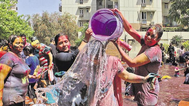 Holi celebrations at Gurgaon’s Sujjan Vihar society. (Praveen Kumar/File Photo) Holi celebrations at Gurgaon’s Sujjan Vihar society. (Praveen Kumar/File Photo)