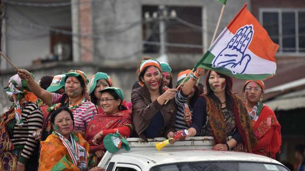 Supporters of the Congress party wave their flags as they celebrate their candidate's win in state assembly elections in Imphal. (Biju BORO / AFP) Supporters of the Congress party wave their flags as they celebrate their candidate's win in state assembly elections in Imphal. (Biju BORO / AFP)