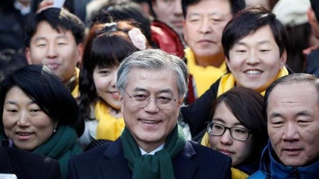 Moon Jae-in (C), former human rights lawyer and presidential candidate of the main opposition Democratic United Party, attends a campaign encouraging people to vote, in Seoul, South Korea. (Reuters File Photo) Moon Jae-in (C), former human rights lawyer and presidential candidate of the main opposition Democratic United Party, attends a campaign encouraging people to vote, in Seoul, South Korea. (Reuters File Photo)