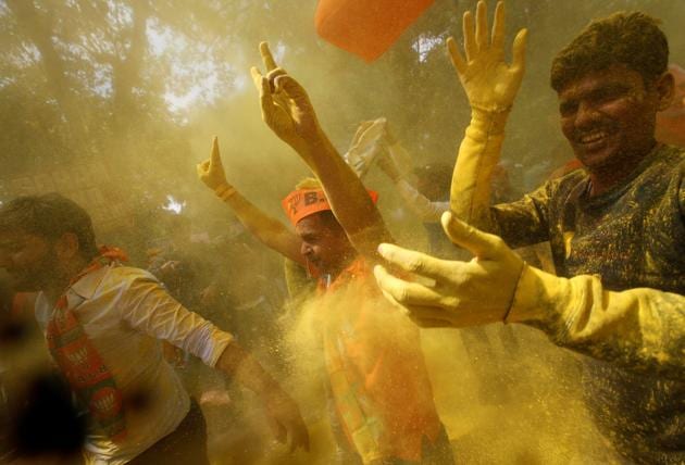 Supporters of India’s Bharatiya Janata Party (BJP) celebrate after learning of the initial poll results outside the party headquarters in New Delhi, India, March 11, 2017. (Adnan Abidi / REUTERS) Supporters of India’s Bharatiya Janata Party (BJP) celebrate after learning of the initial poll results outside the party headquarters in New Delhi, India, March 11, 2017. (Adnan Abidi / REUTERS)