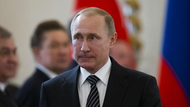 Russian President Vladimir Putin enters a hall to hold talks with Turkey's President Recep Tayyip Erdogan in the Kremlin in Moscow.(AP)