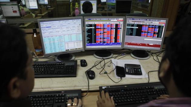 Traders at work near Bombay Stock Exchange (BSE) in Mumbai. (HT File Photo) Traders at work near Bombay Stock Exchange (BSE) in Mumbai. (HT File Photo)