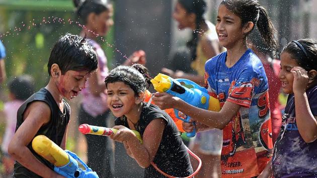 It’s time to attack, but only with water, for this group in Goregaon on Monday. (Pratham Gokhale/HT Photo) 