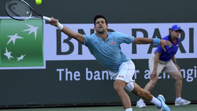 Novak Djokovic in action against Kyle Edmund at the Indian Wells Masters tennis.(AP)