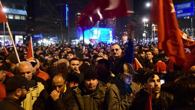 Turkish residents in the Netherlands wave Turkey's national flags as they take part in a gathering outside Turkey's consulate in Rotterdam.(AFP) Turkish residents in the Netherlands wave Turkey's national flags as they take part in a gathering outside Turkey's consulate in Rotterdam.(AFP)