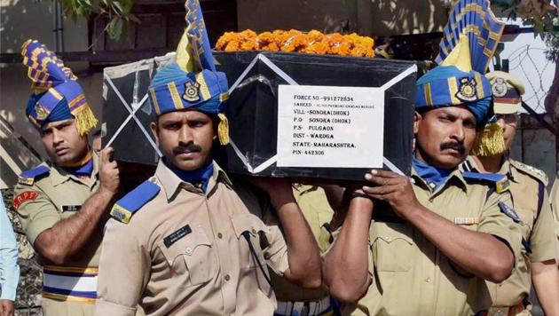 CRPF jawans carry the coffin of HC Premdas Mendhe, killed in an ambush by Maoists in Sukma district of Chhattisgarh, at Nagpur Airport on Sunday.(PTI)