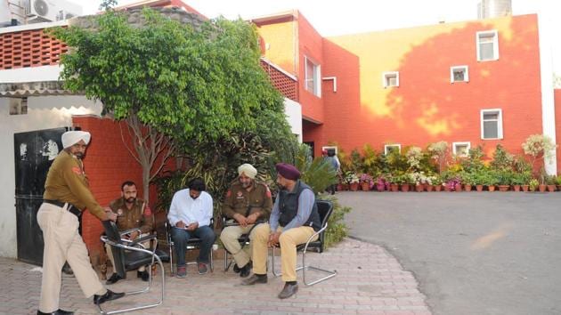 Police at the residence of former Punjab minister Parminder Singh Dhindsa in Sector 2, Chandigarh, on Sunday.(Anil Dayal/HT)