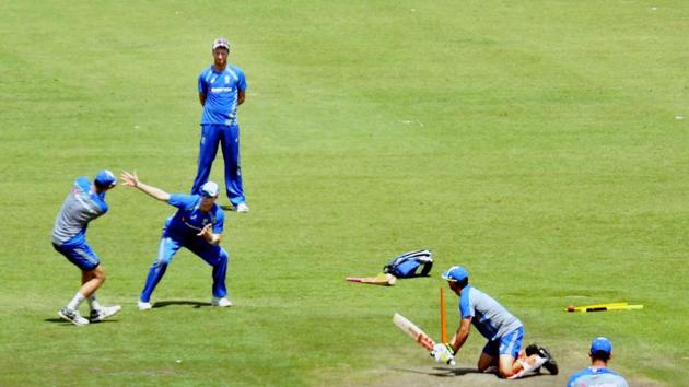 Australia’s players warm-up as they aim to bounce back after their loss in Bangalore. (PTI) Australia’s players warm-up as they aim to bounce back after their loss in Bangalore. (PTI)