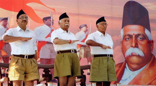 File photo of RSS Chief Mohan Bhagwat (C) . The RSS has become increasingly assertive it the field of education with many people with open affiliations to the organisation securing top academic jobs.(PTI)