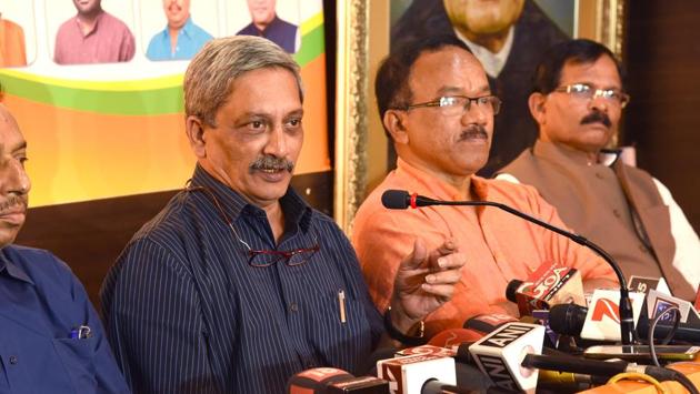 Manohar Parrikar briefing media in Panaji on Saturday after results of the Goa assembly elections results were declared. Also seen are (L to R) former CM Laxmikant Parsekar and Union minister for Ayush (MoS) Shripad Naik in Panaji. (HT Photo) Manohar Parrikar briefing media in Panaji on Saturday after results of the Goa assembly elections results were declared. Also seen are (L to R) former CM Laxmikant Parsekar and Union minister for Ayush (MoS) Shripad Naik in Panaji. (HT Photo)