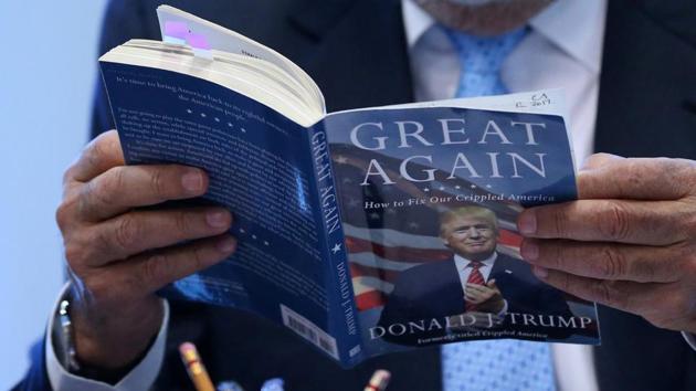 A book ‘Great Again: How to fix our crippled America” by Donald Trump. Many books in the US aimed at children have been updated with a new section on President Trump.(REUTERS File/ Representational Photo)