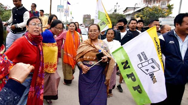 Supporters of National People’s Party (NPP) celebrate after their candidate’s win in Imphal, Manipur on Saturday. The BJP claims to have the support of the four NPP MLAs to form the government in Manipur(PTI)