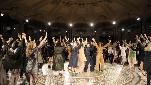 Models dance on the runway at the Stella McCartney Autumn/Winter 2017 fashion show during Paris Fashion Week. Models dance on the runway at the Stella McCartney Autumn/Winter 2017 fashion show during Paris Fashion Week.
