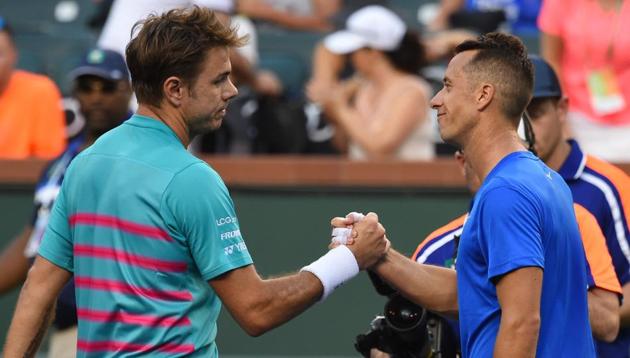 Stan Wawrinka (left) shakes hands with Philipp Kohlschreiber after their third round match at Indian Wells Masters. (USA Today Sports) Stan Wawrinka (left) shakes hands with Philipp Kohlschreiber after their third round match at Indian Wells Masters. (USA Today Sports)