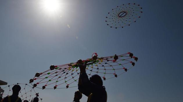 A Nihang performs 'Gatka', an ancient form of Sikh martial art, during the Hola Mohalla festival in Anandpur Sahib.  (Money SHARMA/AFP) 